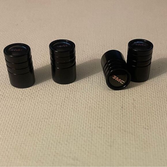 GMC Logo valve Stem caps in Black set of 4 NWT - Picture 2 of 4